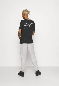 YOURTURN Unisex - Trainingsbroek - Mottled Light Grey 11 YOURTURN Unisex - Trainingsbroek - Mottled Light Grey -Yourturn 44af697d8af34693a7b3385401313f6d