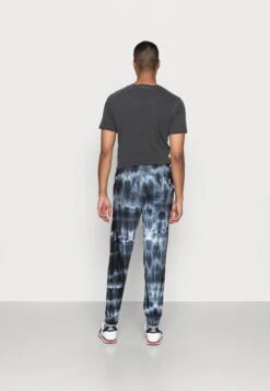 YOURTURN Monochrome Tie Dye Jogger Unisex - Trainingsbroek - Black/Off White -Yourturn 7793c33a8ea44501a122fcabc111a020